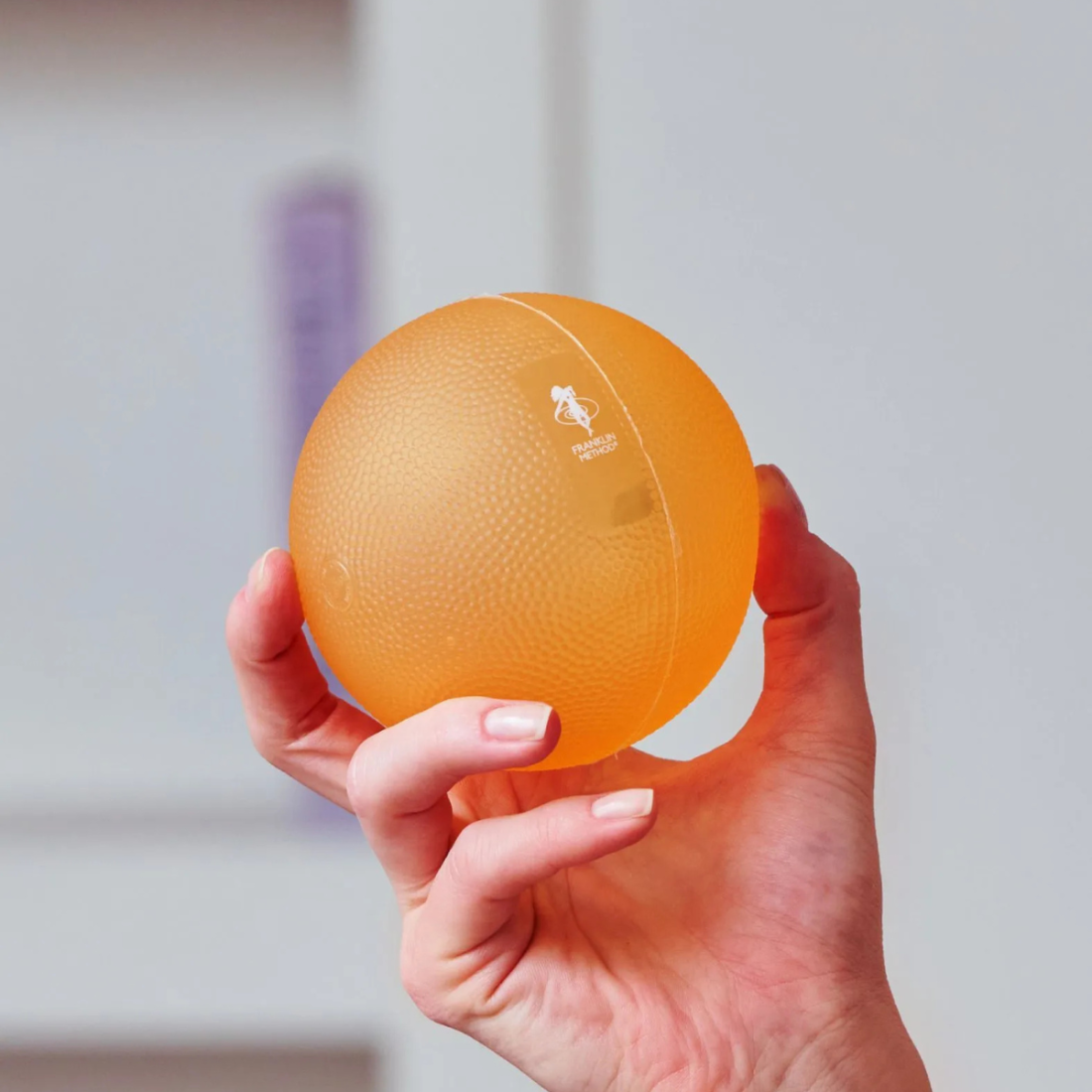 М'ячик для масажу Franklin-Method® Tough Ball 9,5 см для МФР твердий помаранчевий