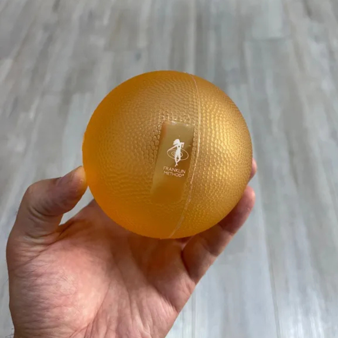 М'ячик для масажу Franklin-Method® Tough Ball 9,5 см для МФР твердий помаранчевий