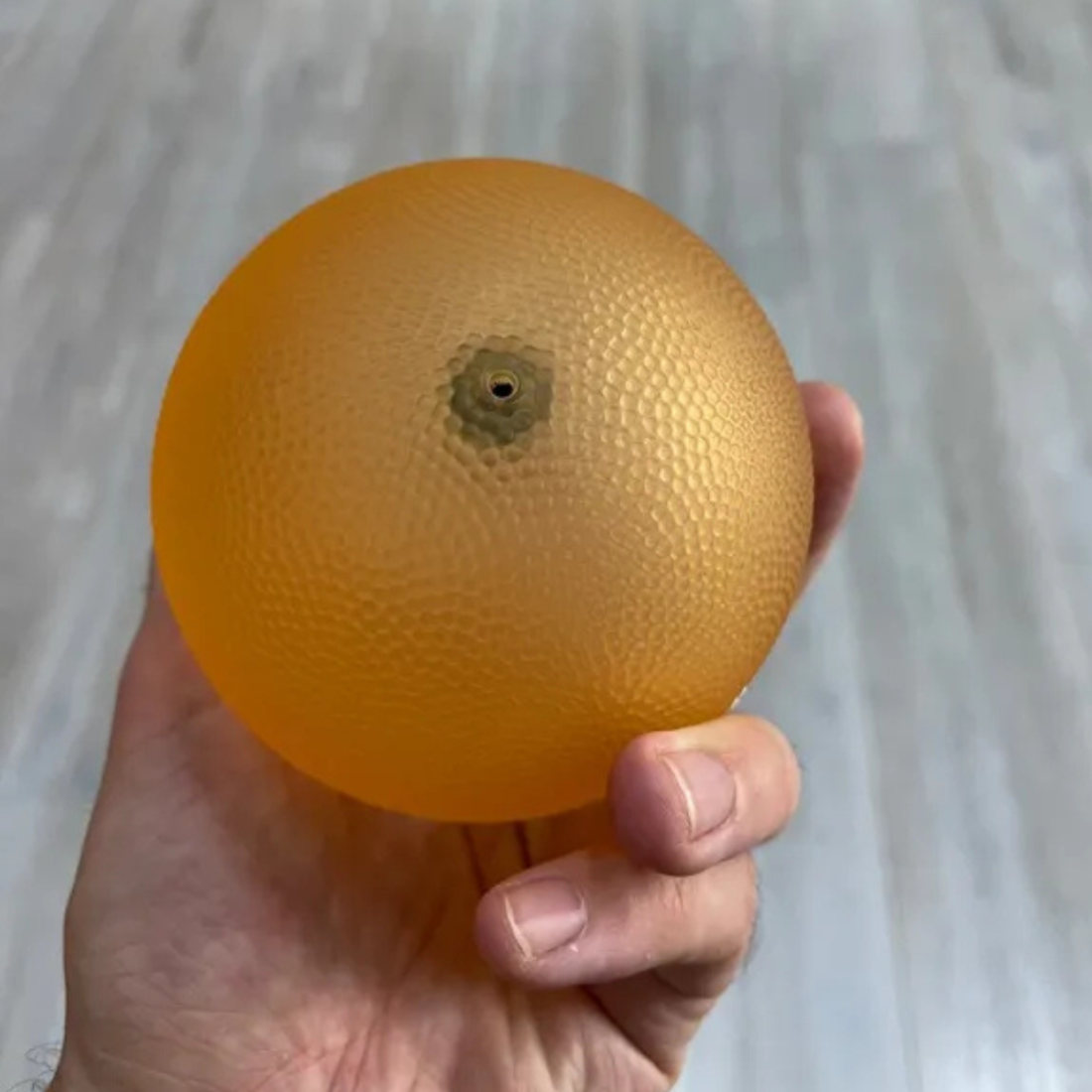 М'ячик для масажу Franklin-Method® Tough Ball 9,5 см для МФР твердий помаранчевий